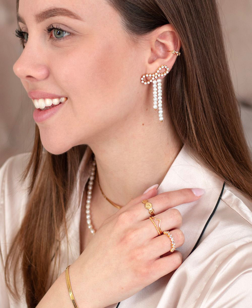 TIDAL KNOT OHRSTECKER